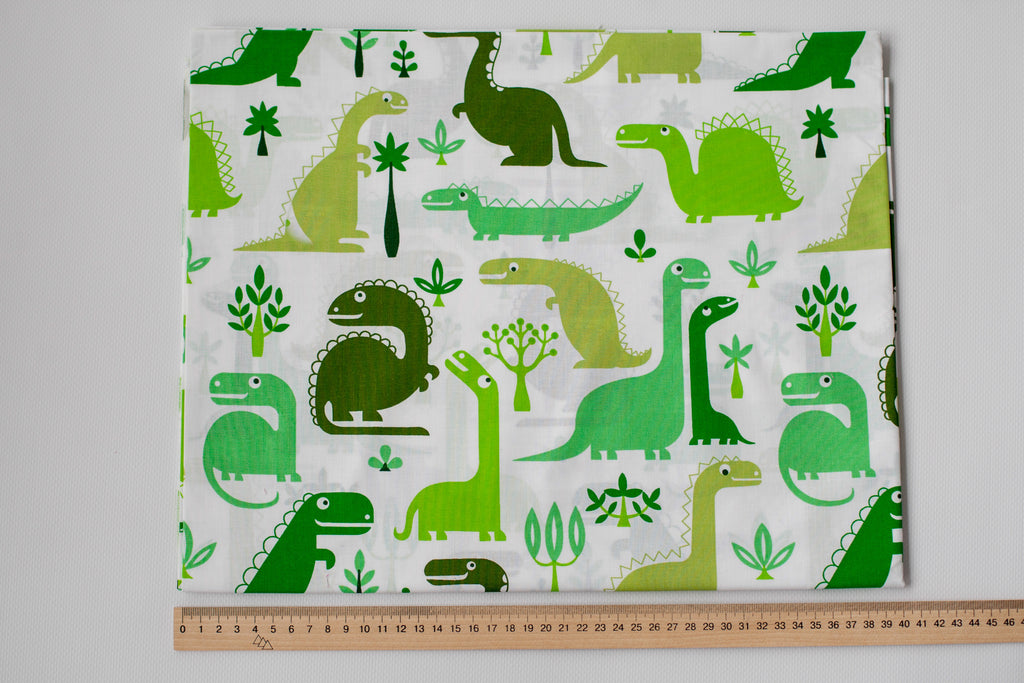 Regular Cotton Fabric - Green Dinosaurs On White
