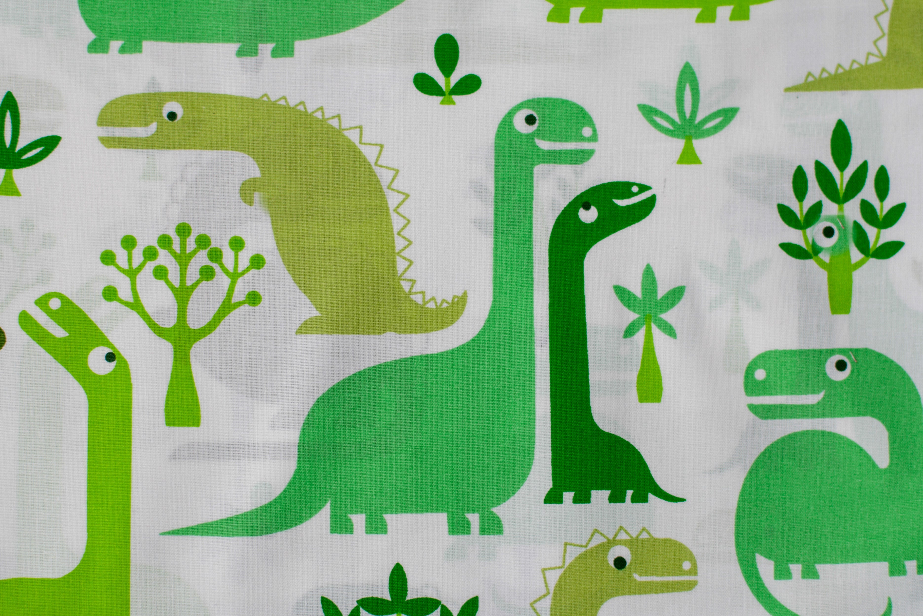Regular Cotton Fabric - Green Dinosaurs On White