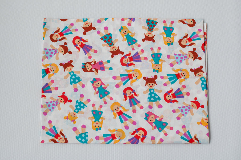 Regular Cotton Fabric - Multicolor Dolls On White