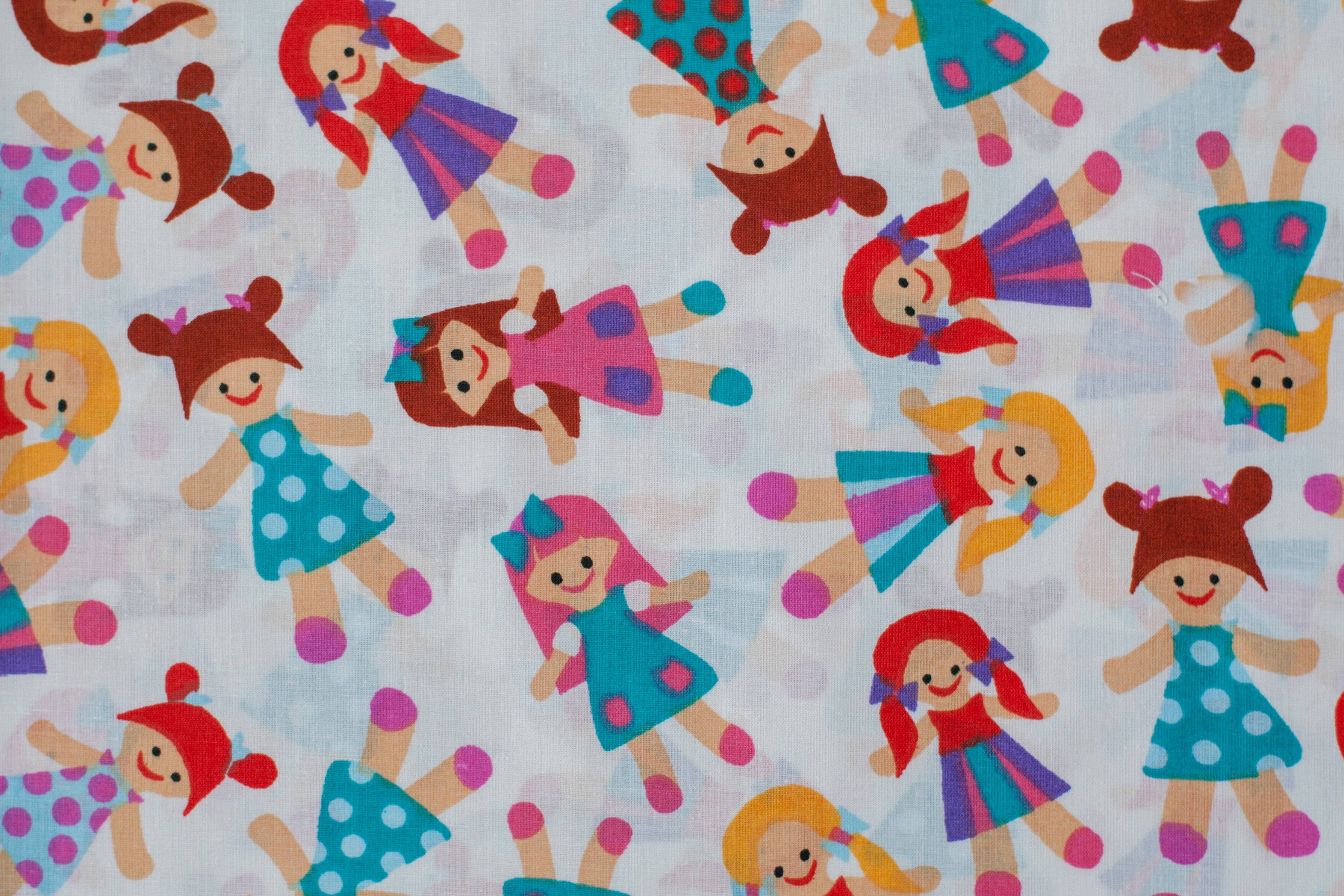 Regular Cotton Fabric - Multicolor Dolls On White