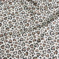 Leopard hearts on a beige background