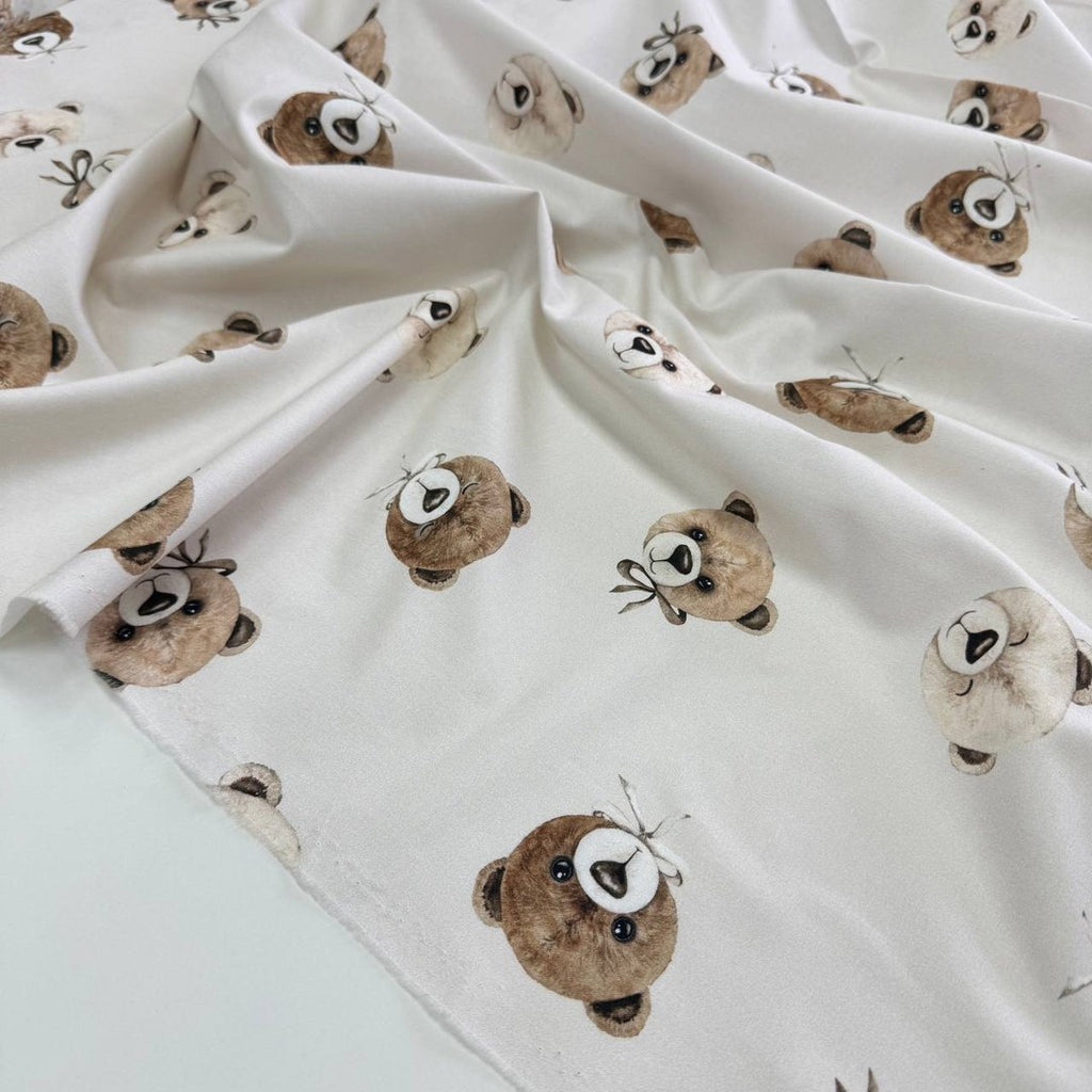 Teddy bears on a light beige background