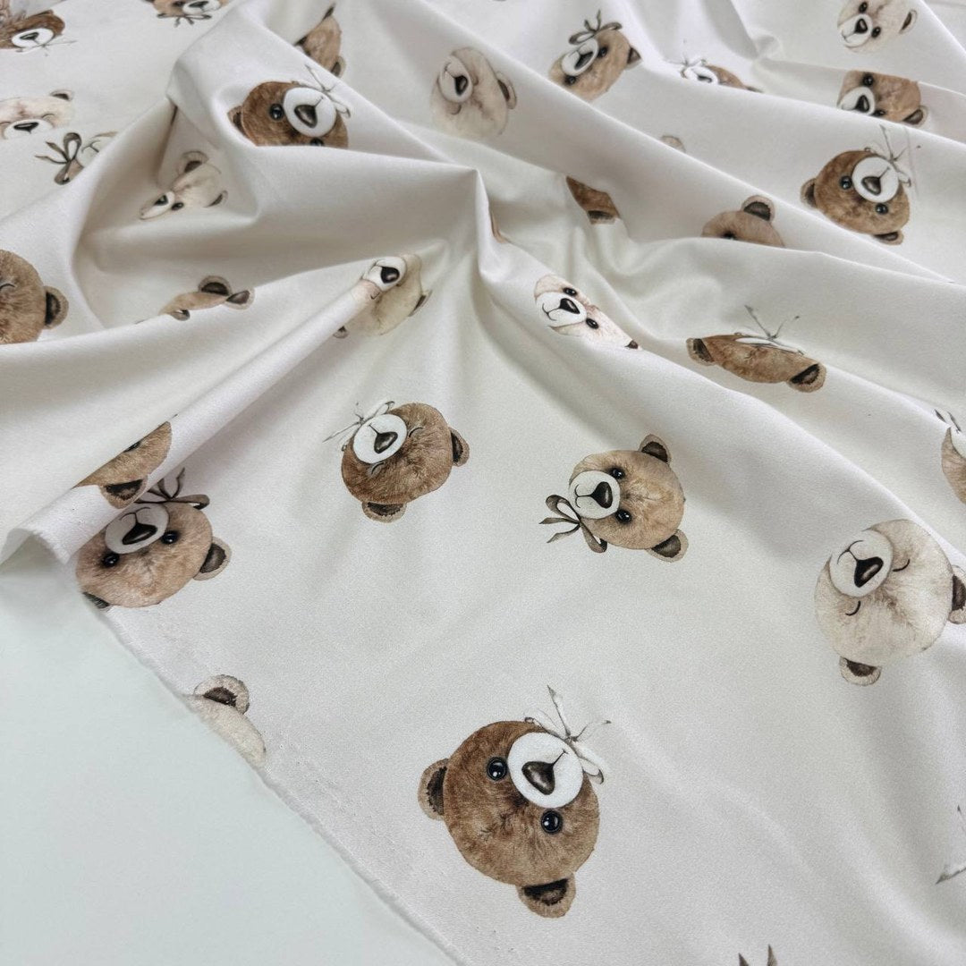 Teddy bears on a light beige background