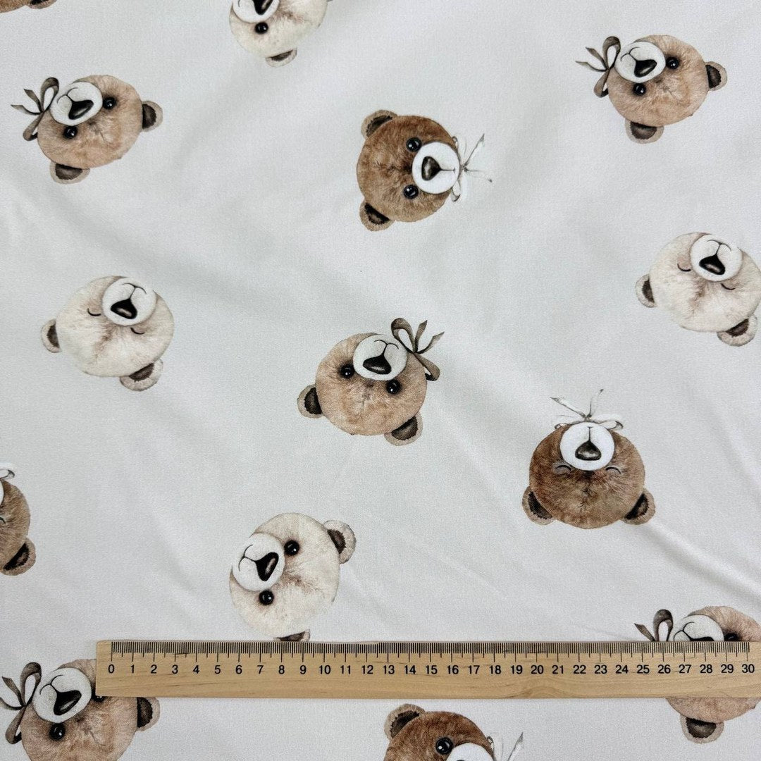 Teddy bears on a light beige background