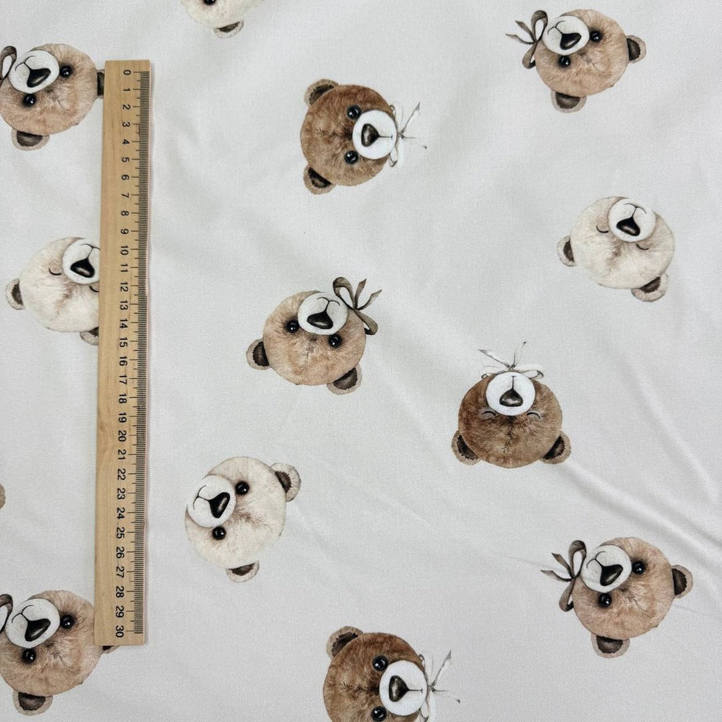 Teddy bears on a light beige background