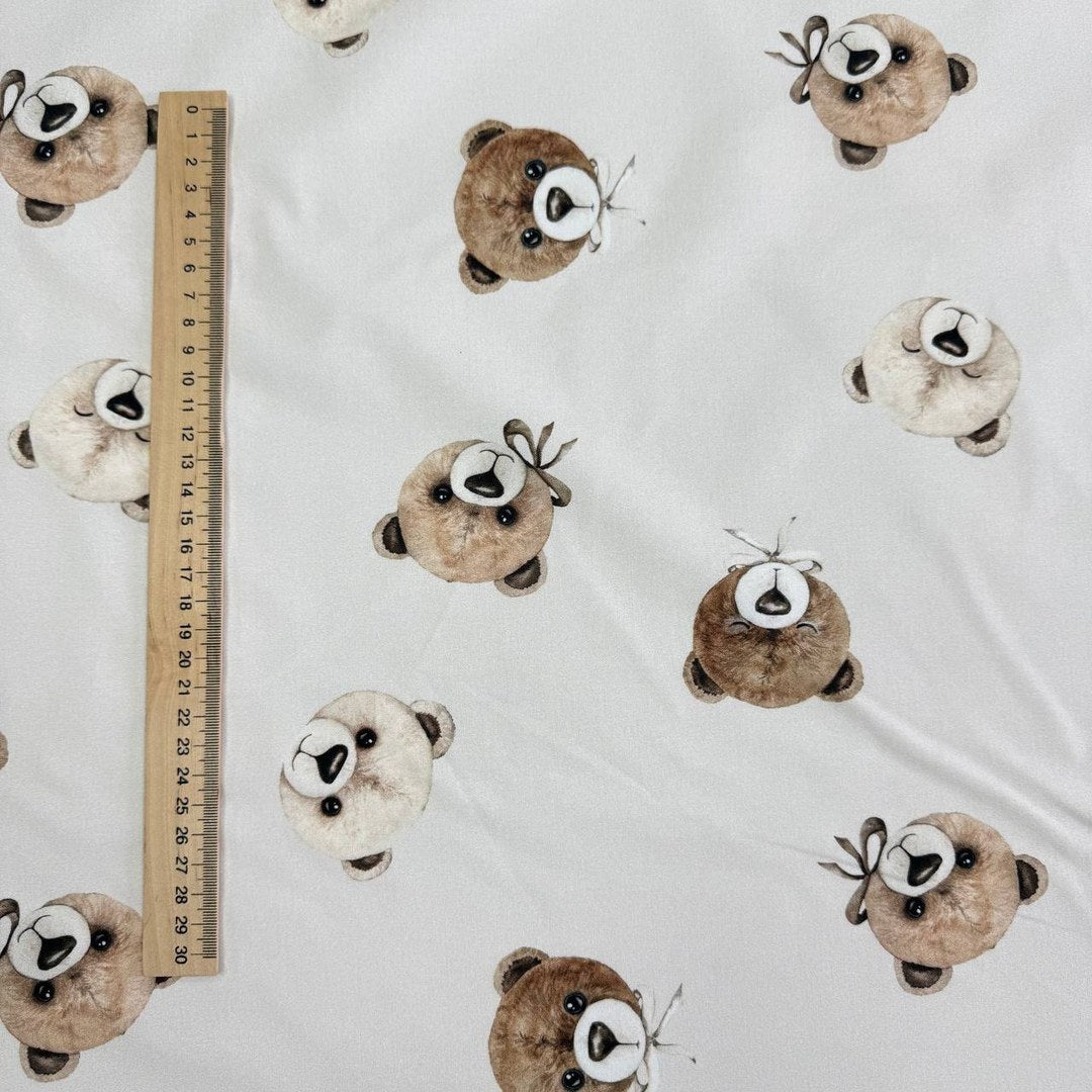 Teddy bears on a light beige background