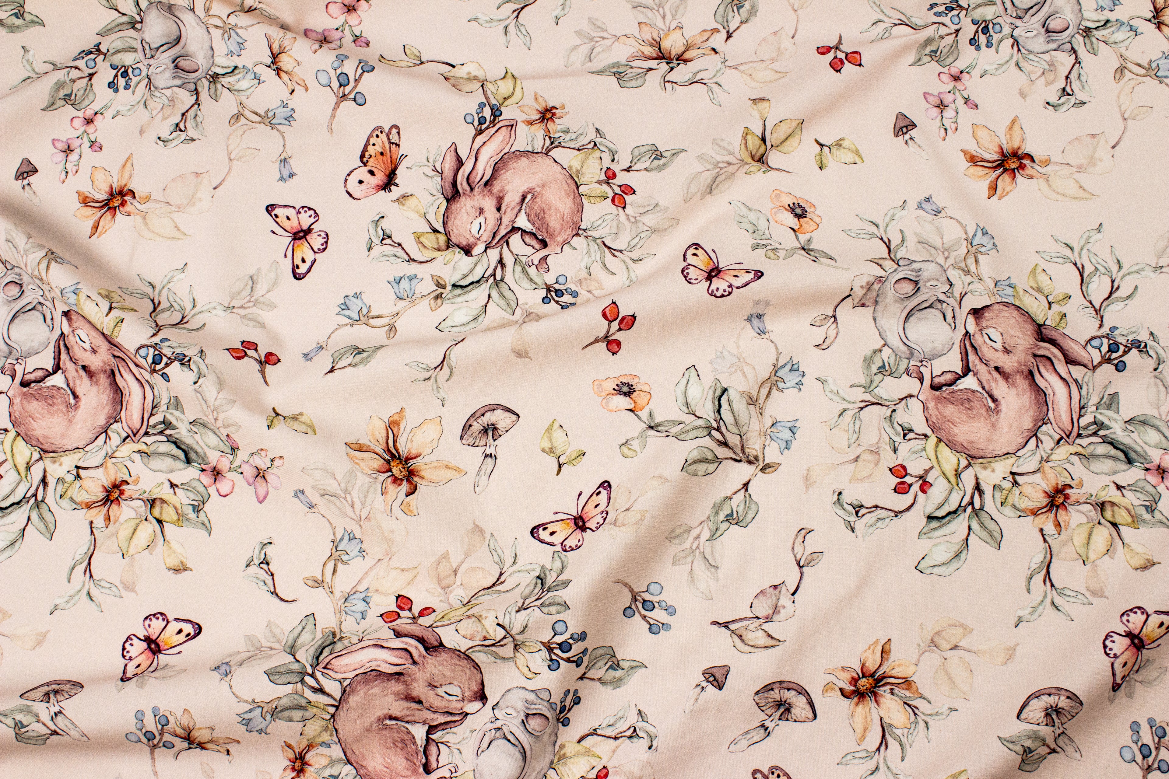Bunny and mouse sleeping on a beige background