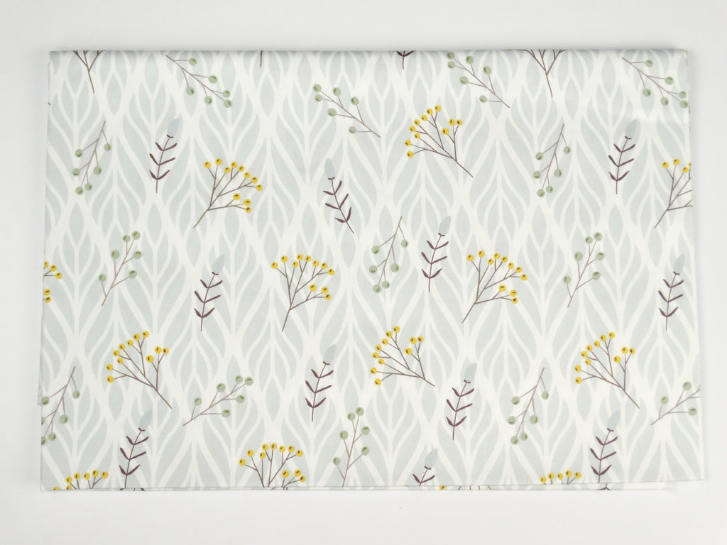 Wildflowers on a gray ornament