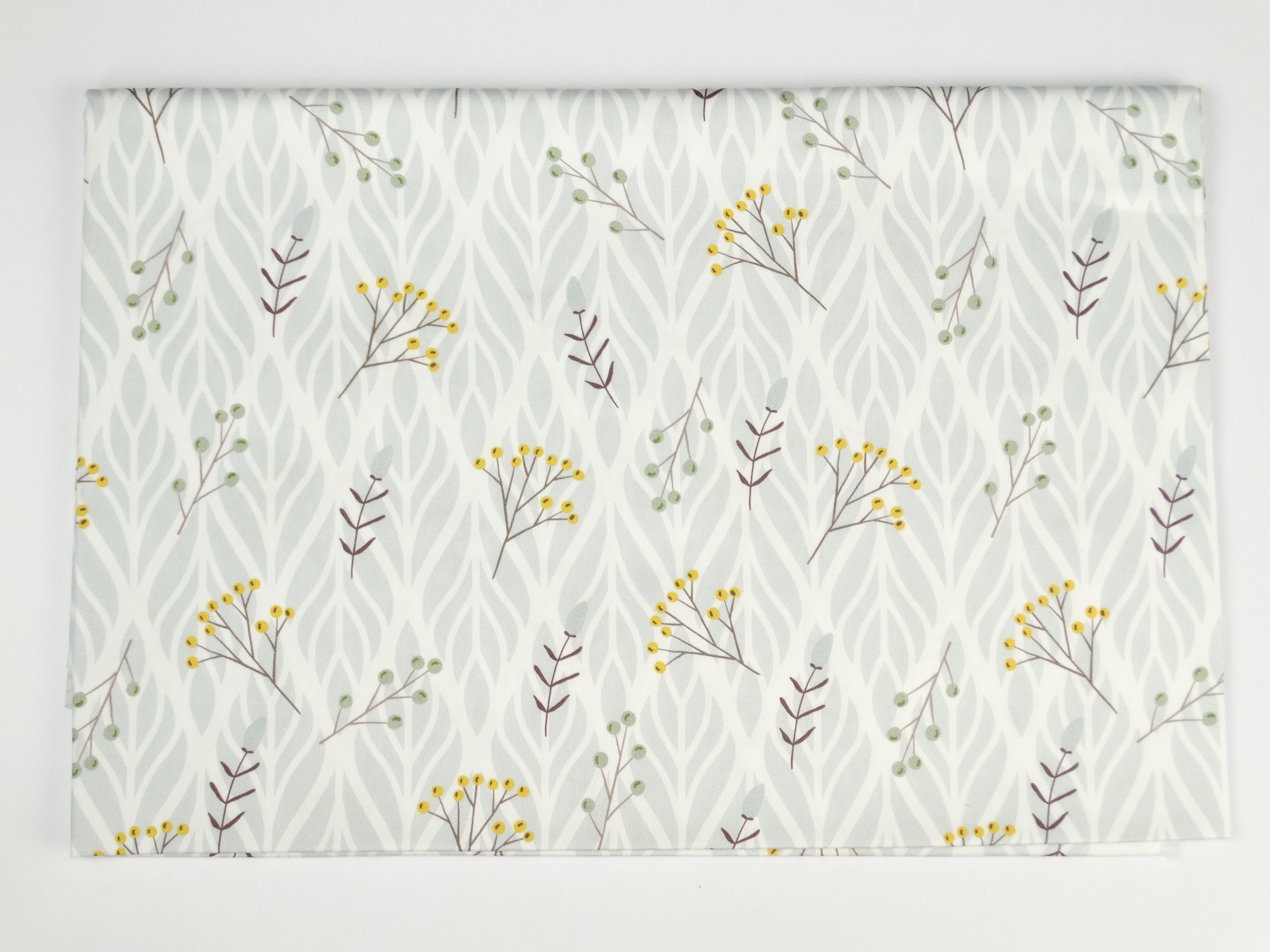 Wildflowers on a gray ornament