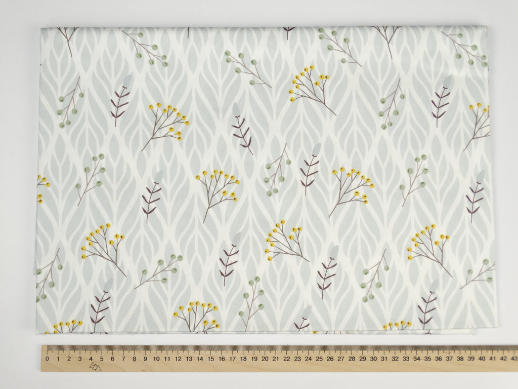 Wildflowers on a gray ornament