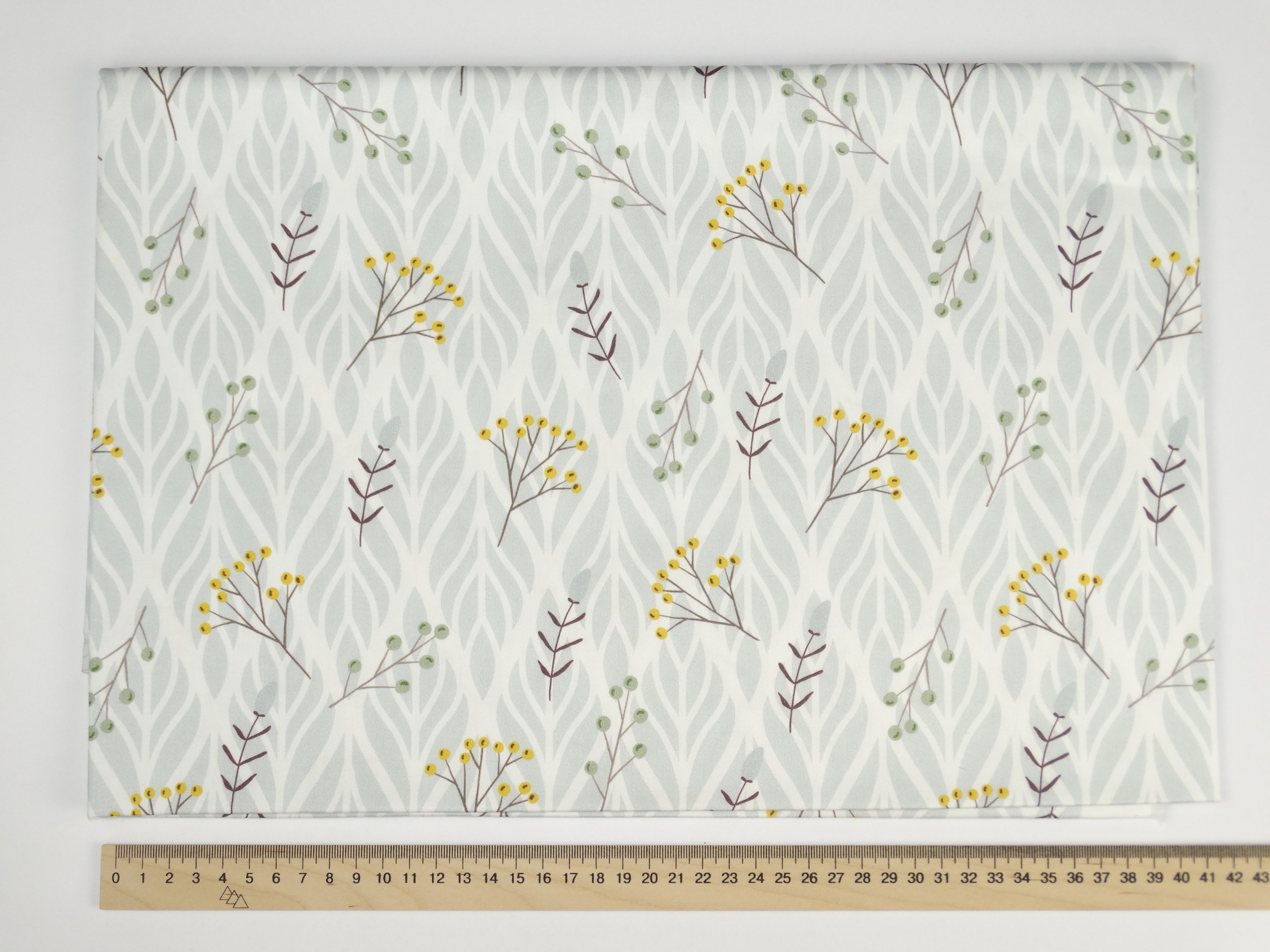 Wildflowers on a gray ornament