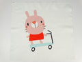 A bunny on a scooter