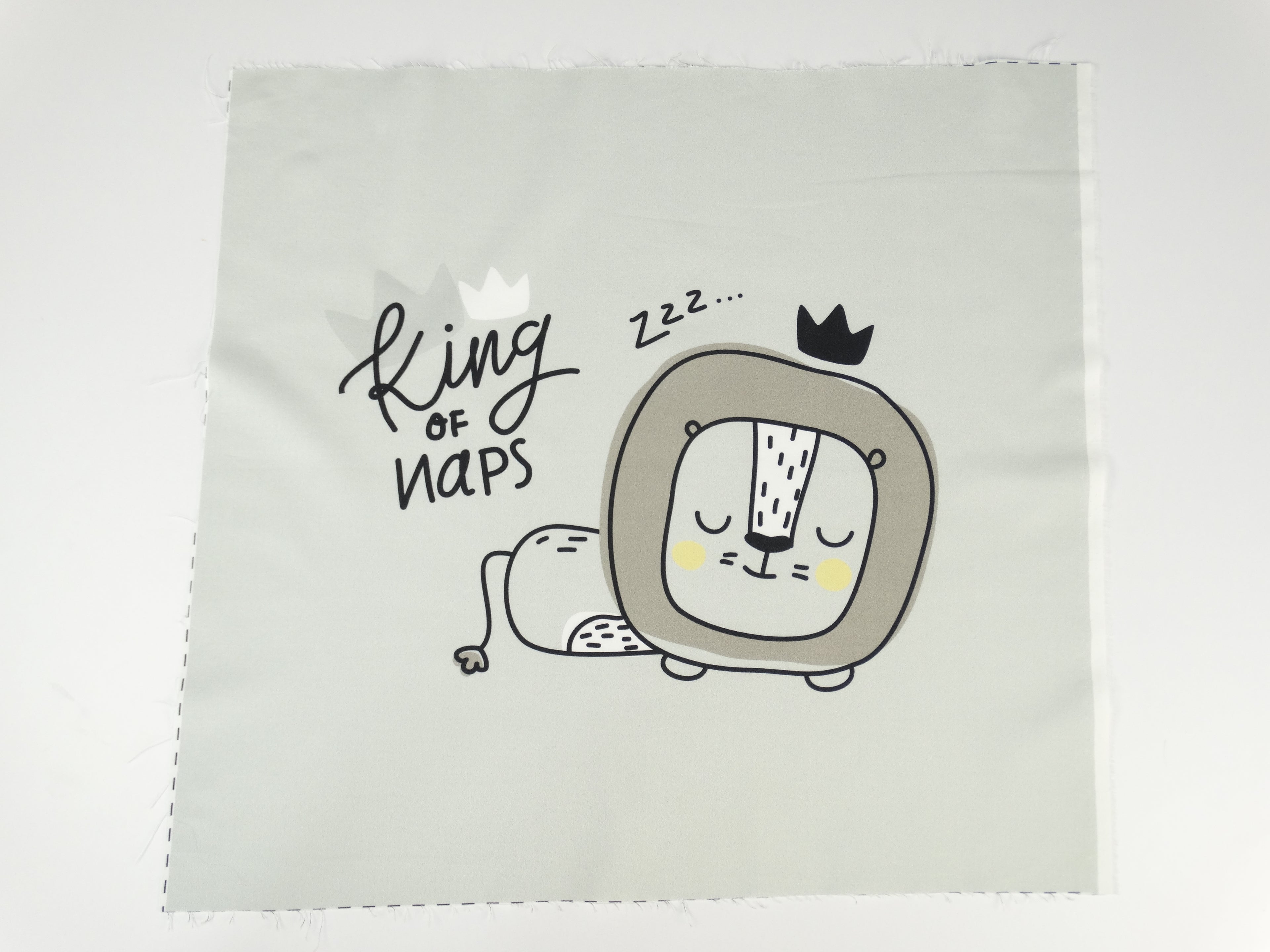 Lion king of naps on light gray