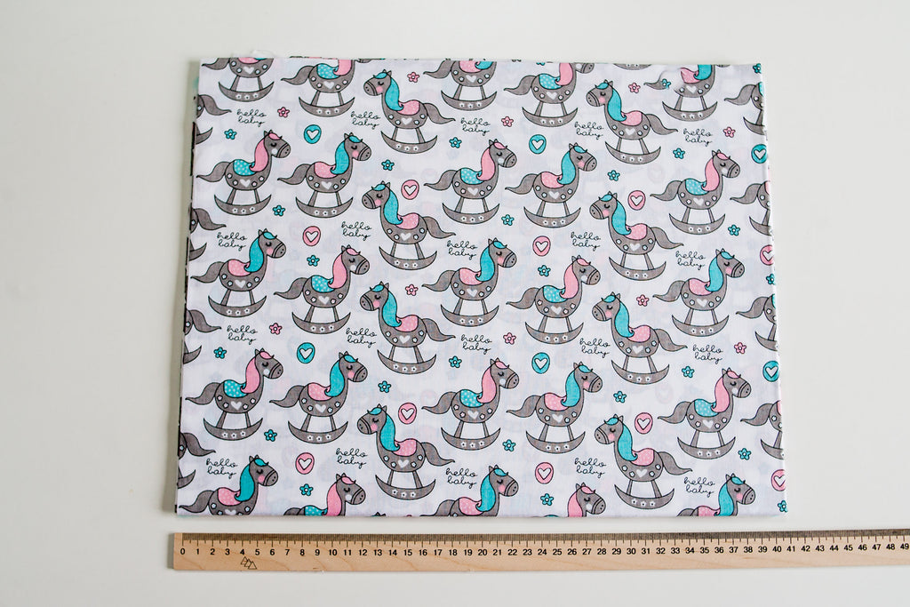 Regular Cotton Fabric - Rozovo Byryuzovye Rocking Horses On White