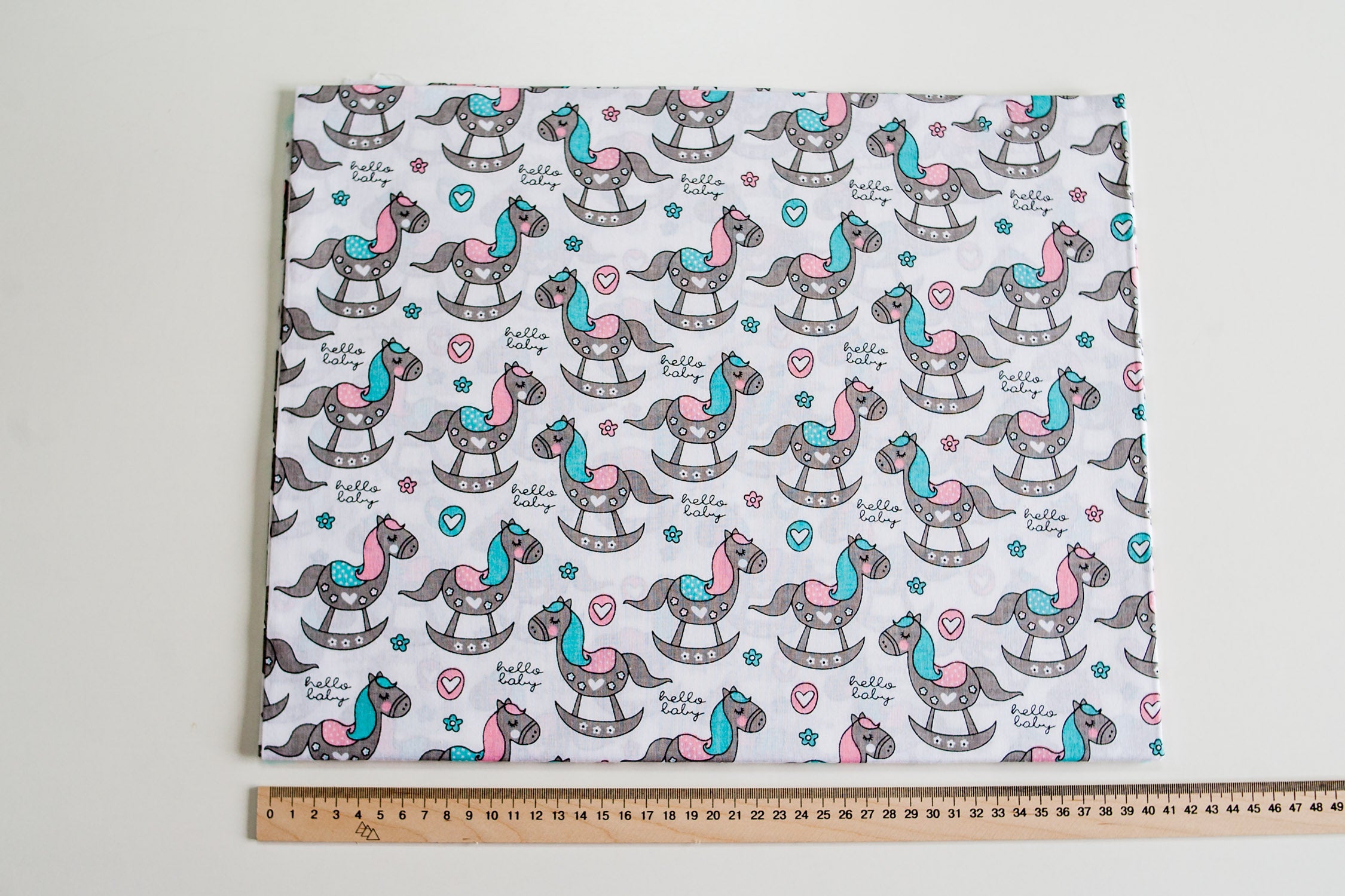 Regular Cotton Fabric - Rozovo Byryuzovye Rocking Horses On White