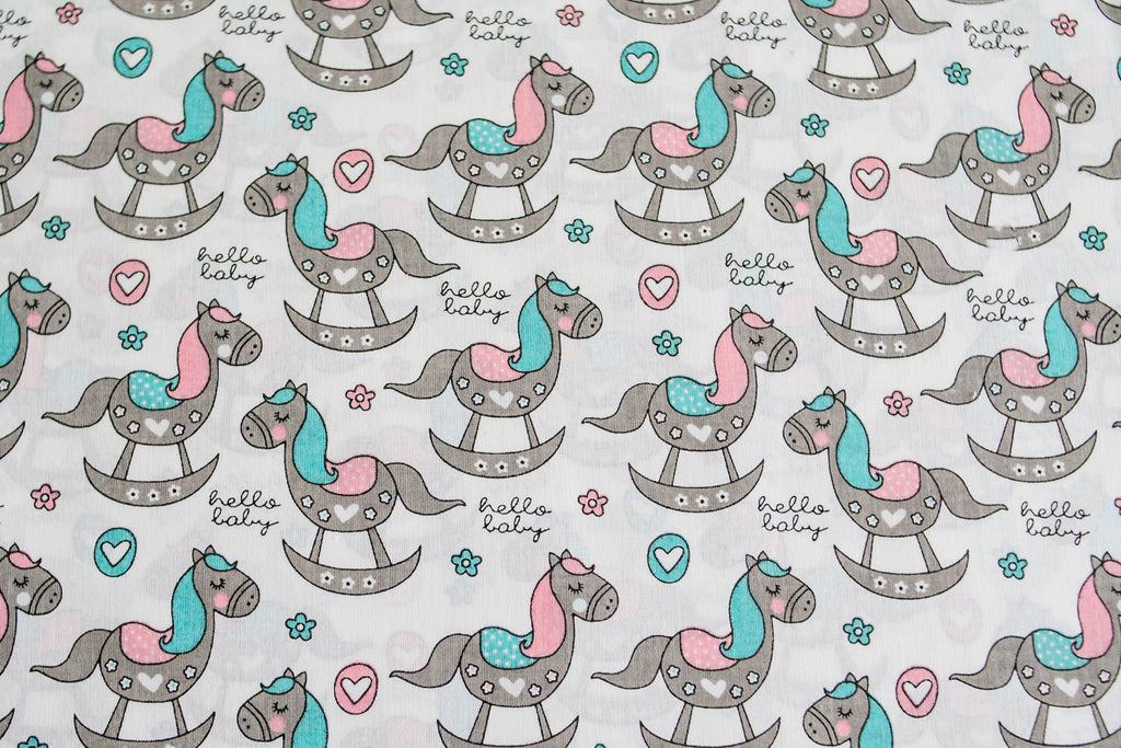 Regular Cotton Fabric - Rozovo Byryuzovye Rocking Horses On White