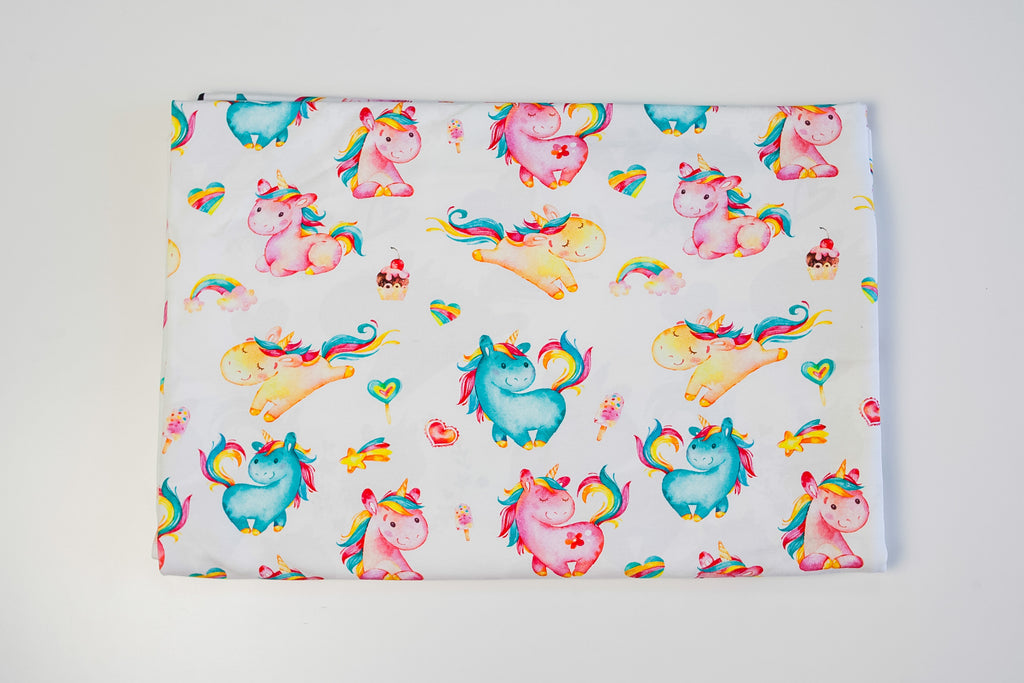 Twin unicorns on white