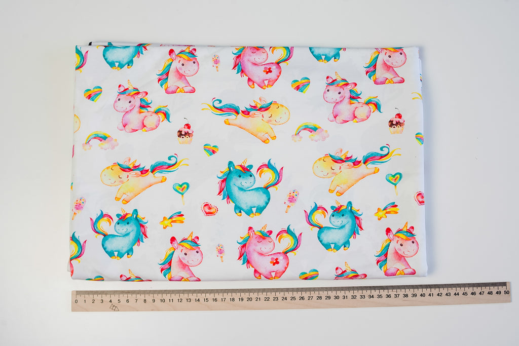 Twin unicorns on white