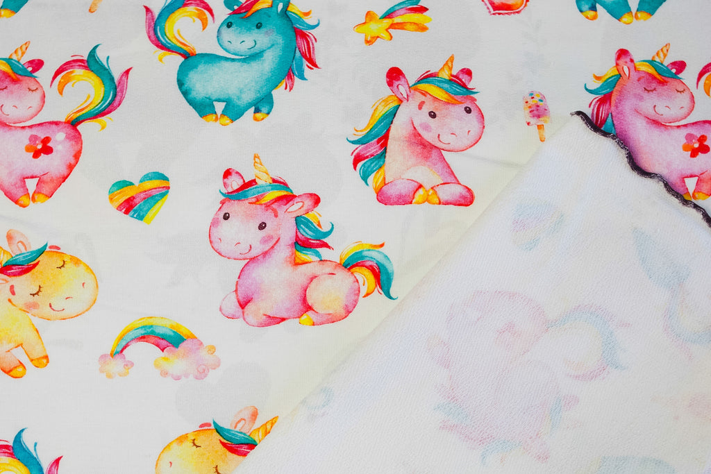 Twin unicorns on white
