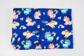 Twin unicorns on blue
