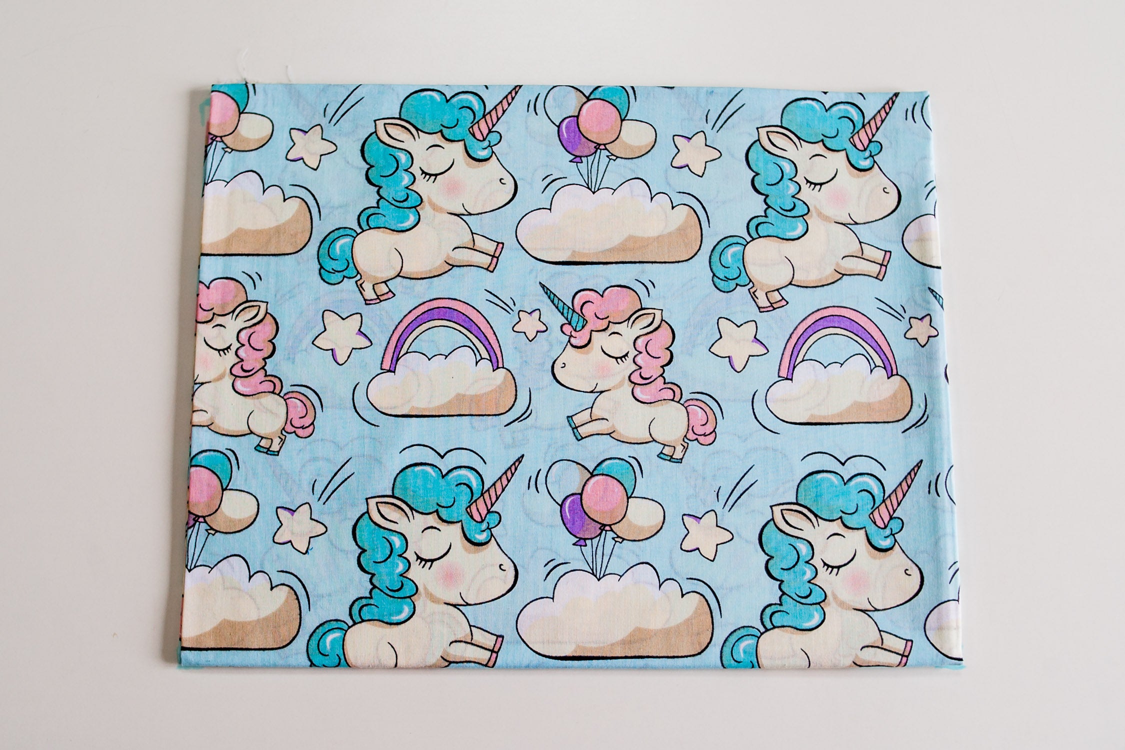 Regular Cotton Fabric - Unicorns With Rainbows On Blue