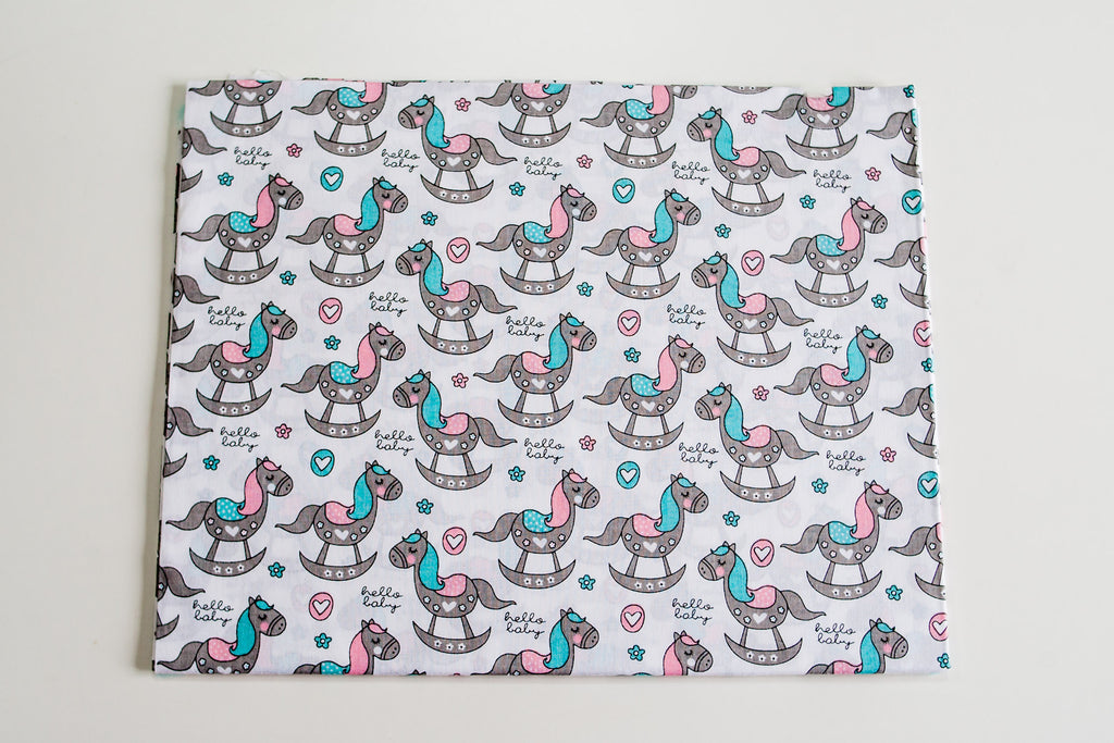 Regular Cotton Fabric - Rozovo Byryuzovye Rocking Horses On White