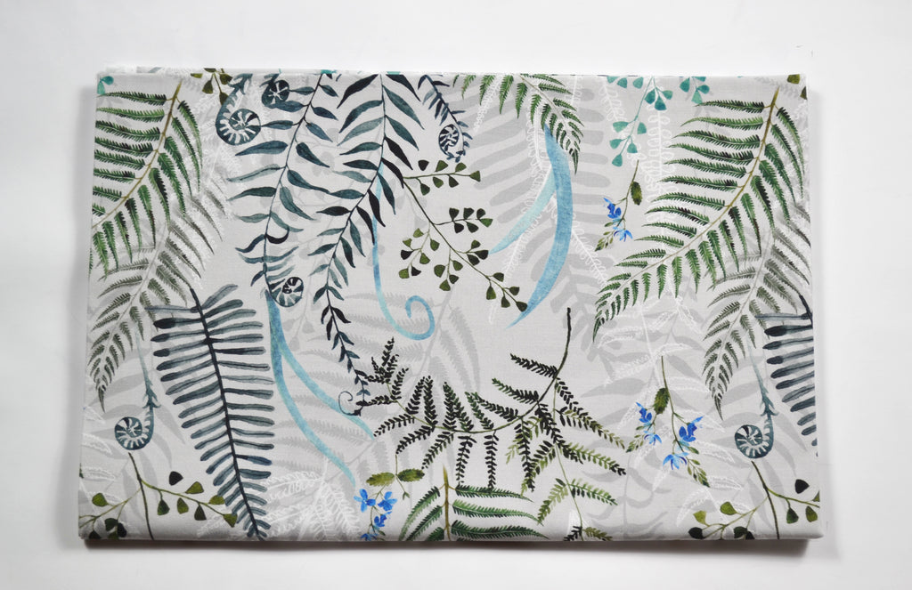 Fern on gray