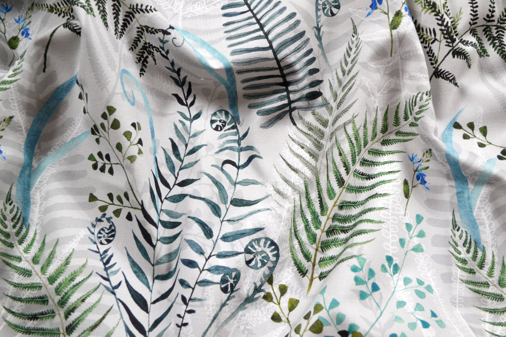 Fern on gray