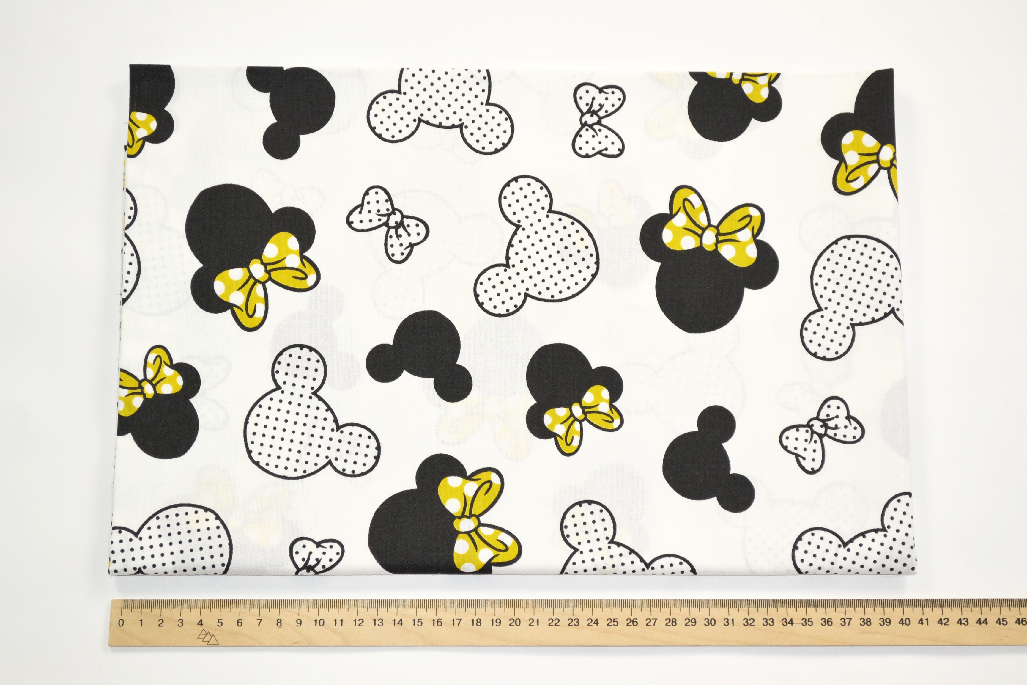 Regular Cotton Fabric - Black And White Mickey Mouse With Zheltymy Bows On White