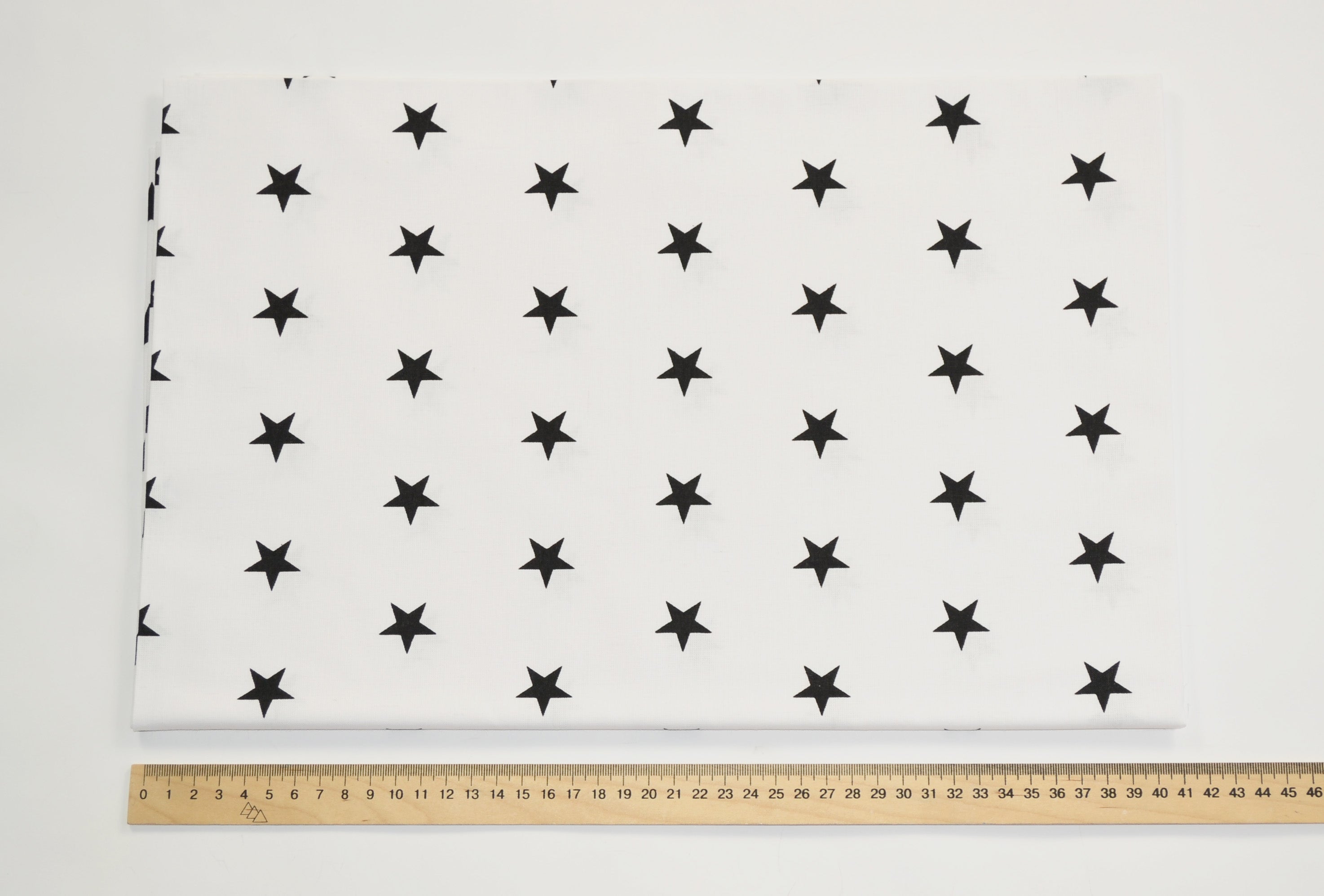 Regular Cotton Fabric - Black Stars On White