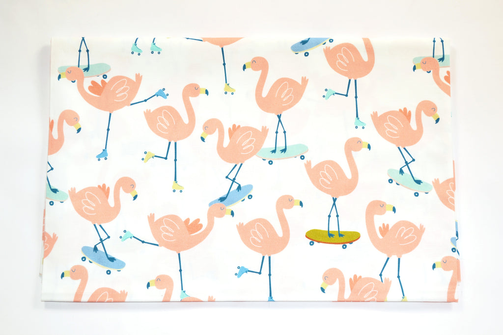 Flamingo on skateboards