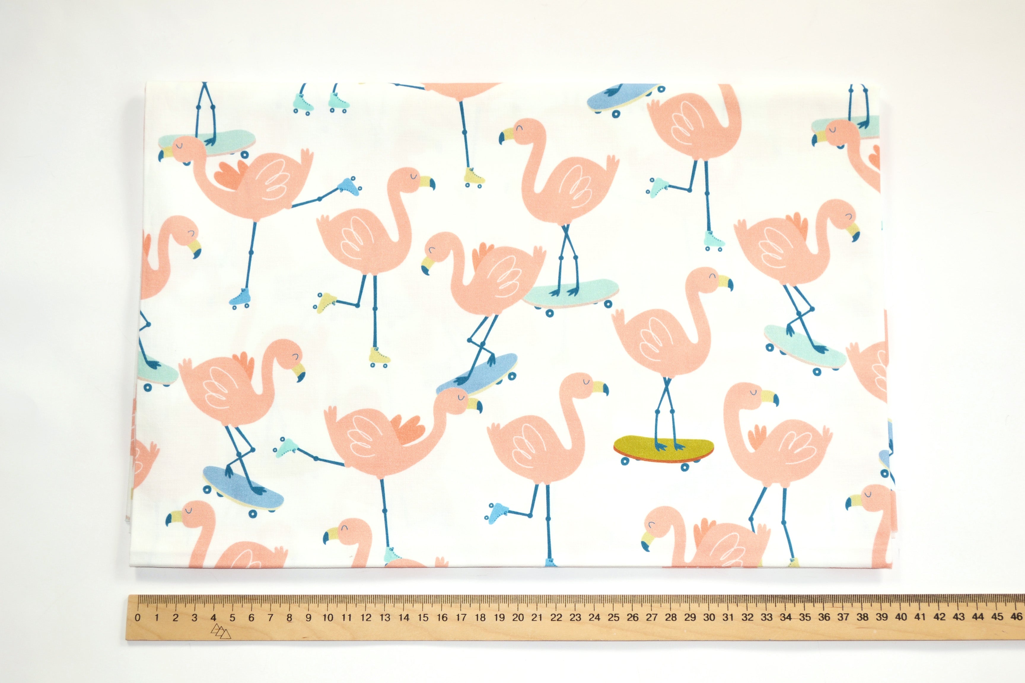 Flamingo on skateboards