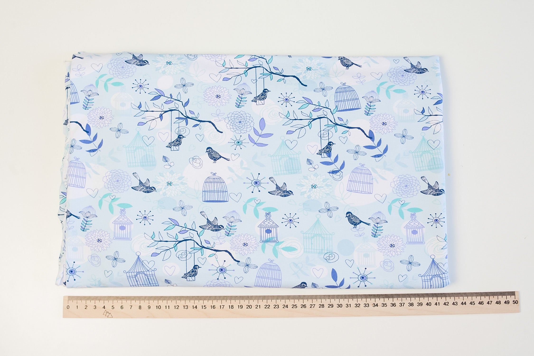 Bird footer in checkered on blue