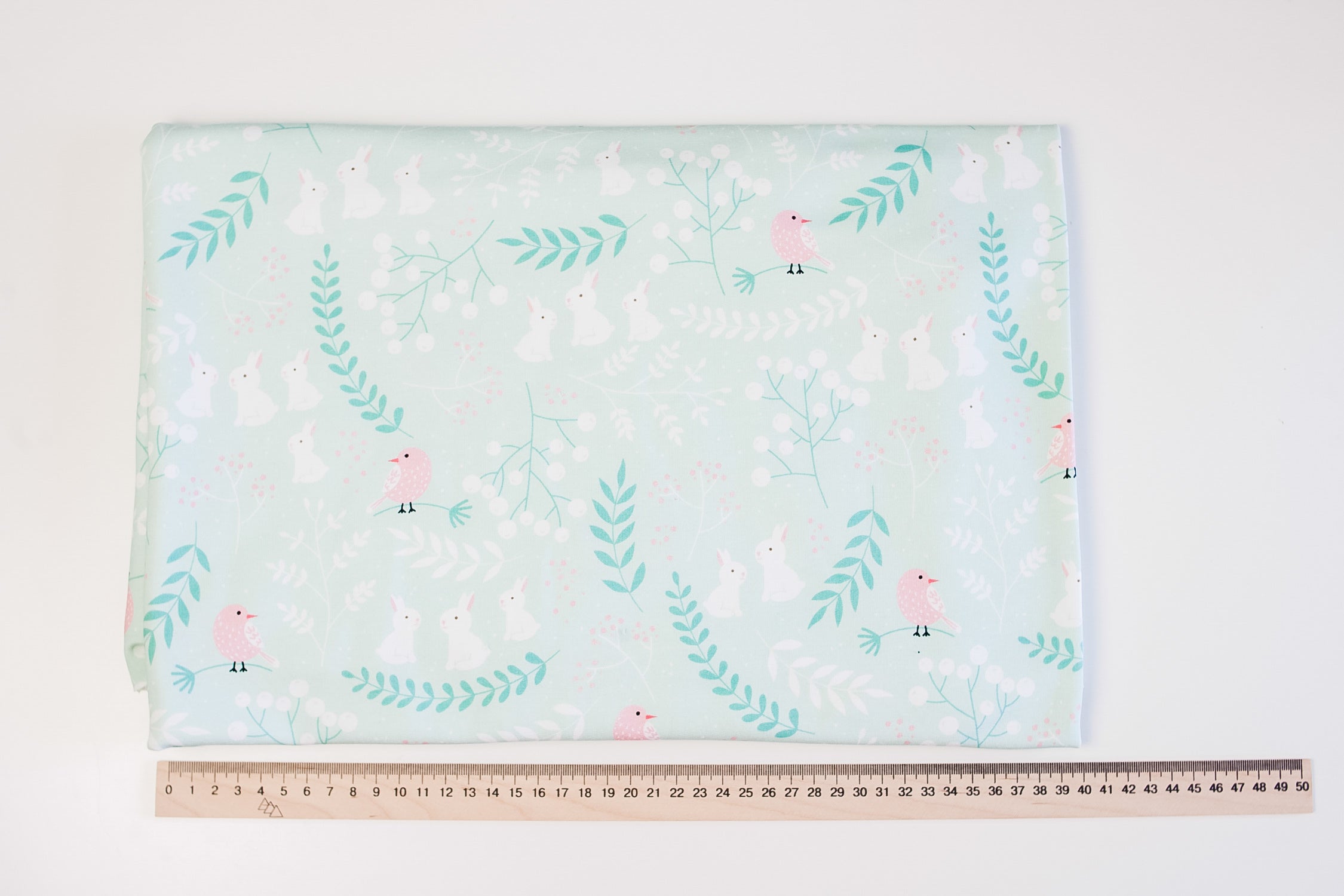 Two-thread birds and rabbits on mint