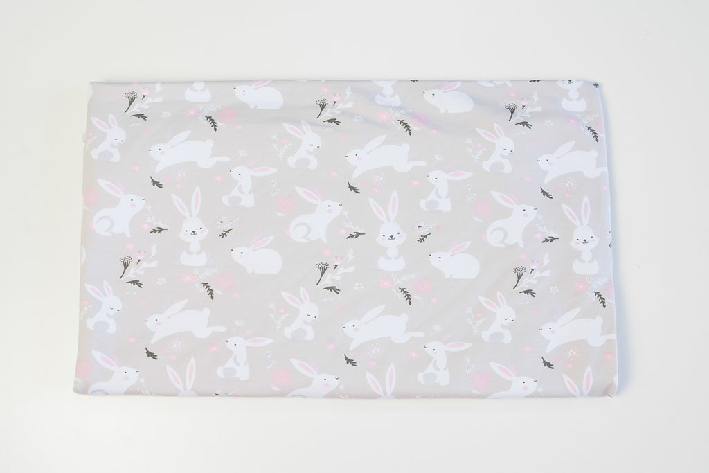 Footer bunnies on gray-beige