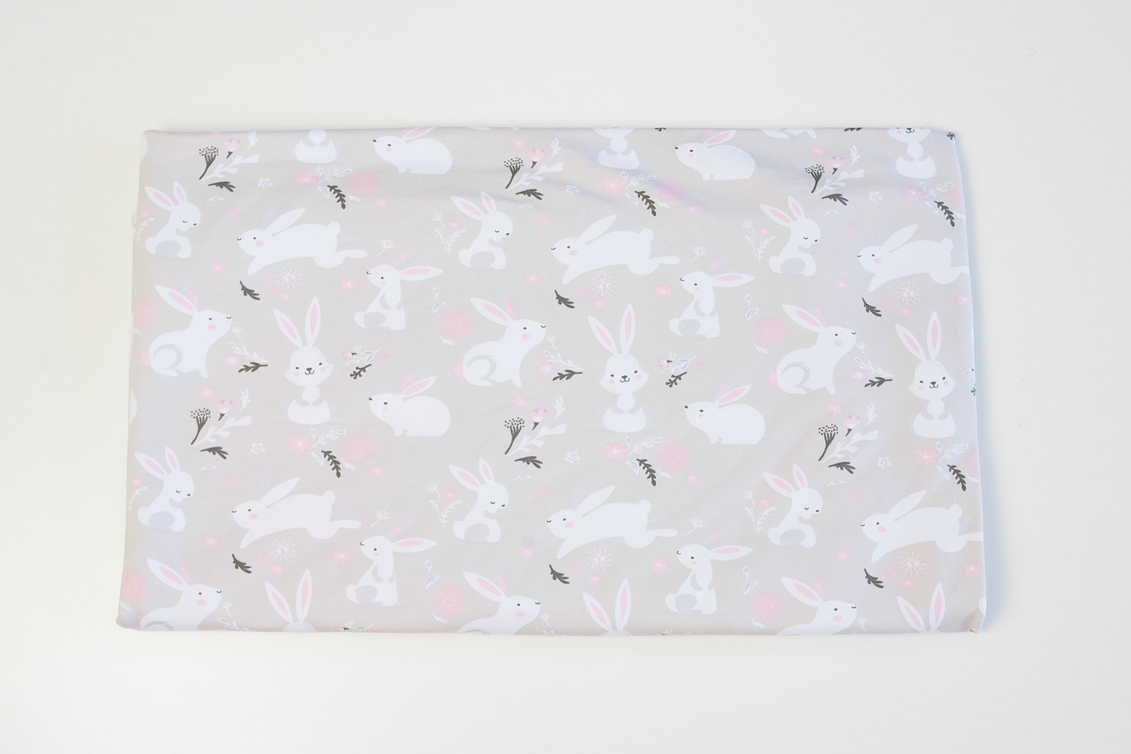 Footer bunnies on gray-beige