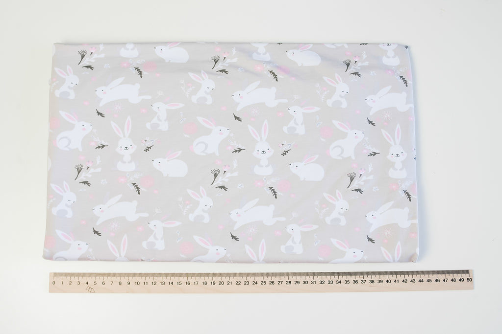 Footer bunnies on gray-beige