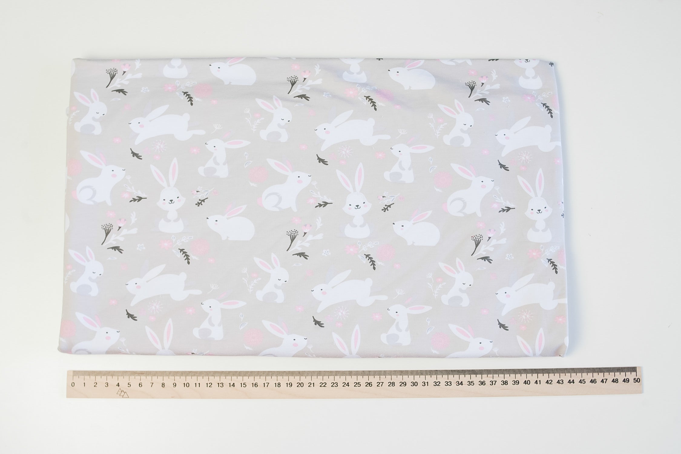 Footer bunnies on gray-beige