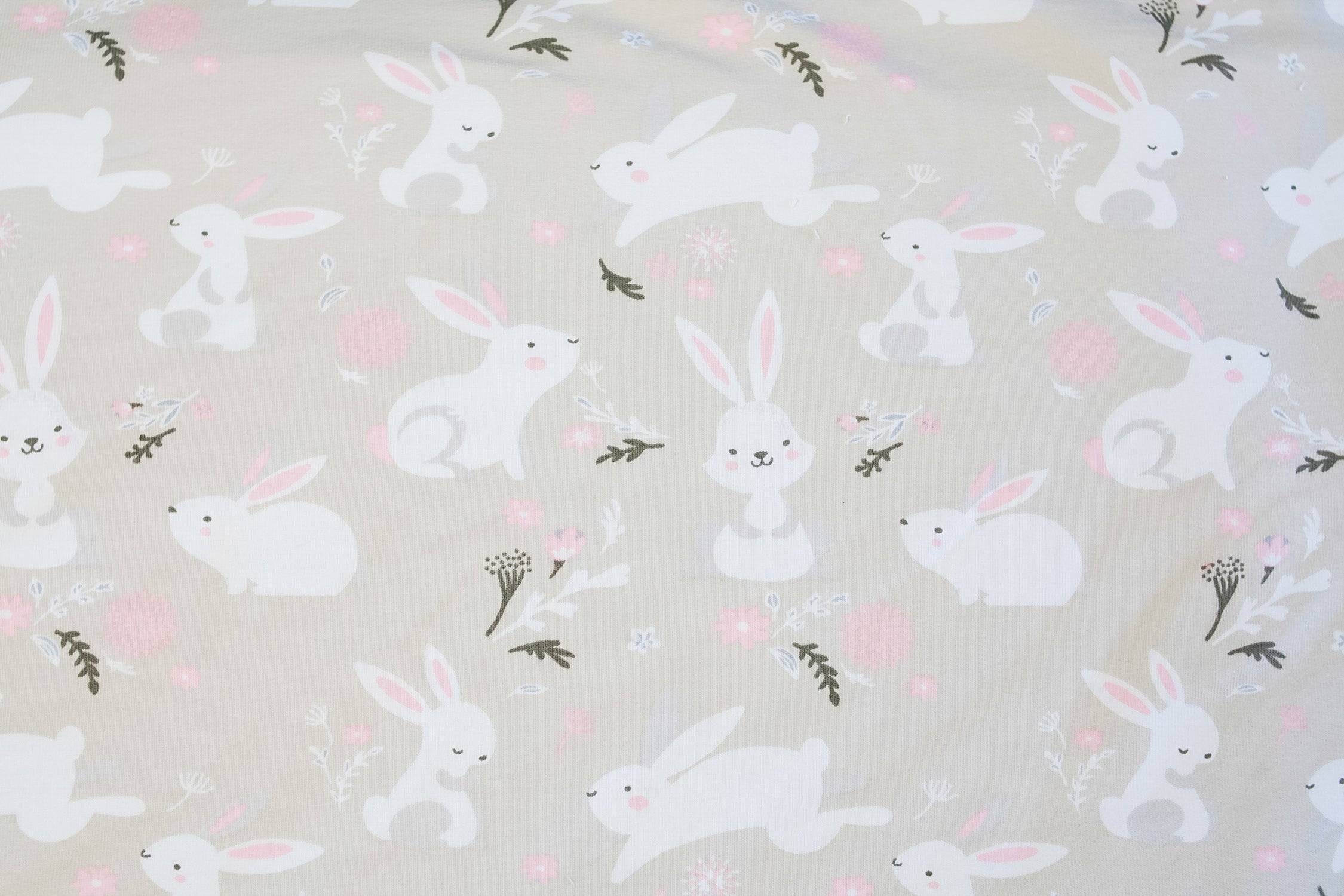 Footer bunnies on gray-beige
